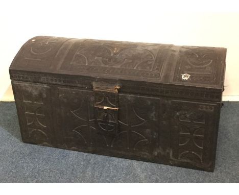 An unusual Antique leather domed top trunk decorated with swags. Est. £120 - £150.