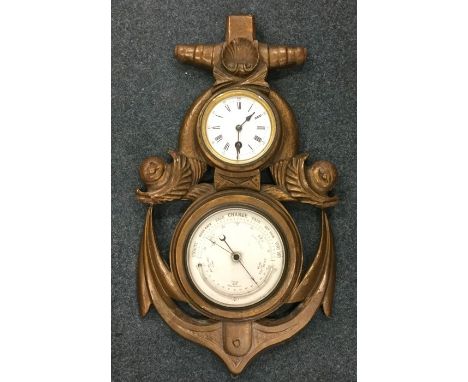 An unusual clock / barometer decorated with an anchor and gilding. Est. £60 - £80.