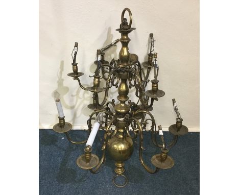 A large Georgian style brass hanging light pendant. Est. £80 - £120.