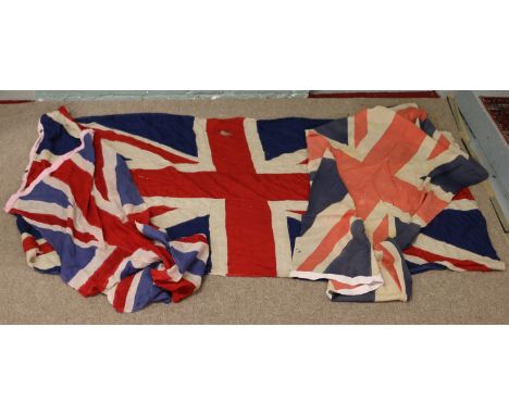Three vintage linen Union flags, largest measuring 243cm x 120cm.