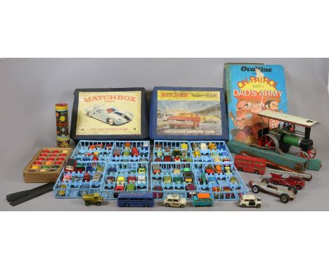 A quantity of vintage toys; two Matchbox collectors cases containing DIecast vehicles, miniature snooker balls, Acme toys Kal