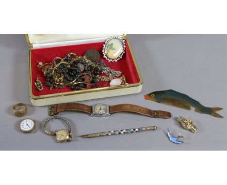 A box of costume jewellery including ladies watches, fish comb etc.