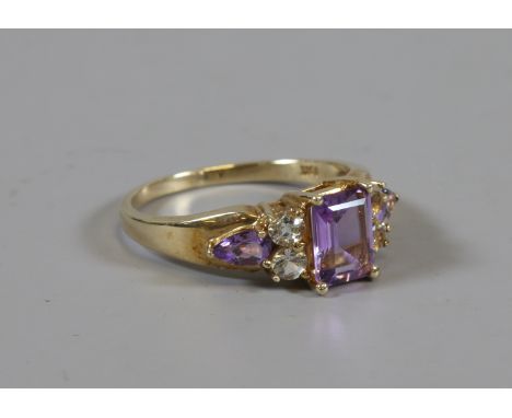 A 9ct gold amethyst and white topaz cluster ring, size R, 3.6 grams.