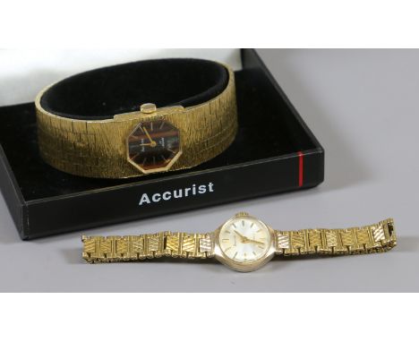 A ladies 9ct gold cased manual bracelet watch by Accurist along with one similar. Condition Report. To be used as a guide onl