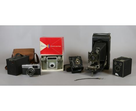 A box of vintage cameras to include Olympus, Kodak, Brownie etc.