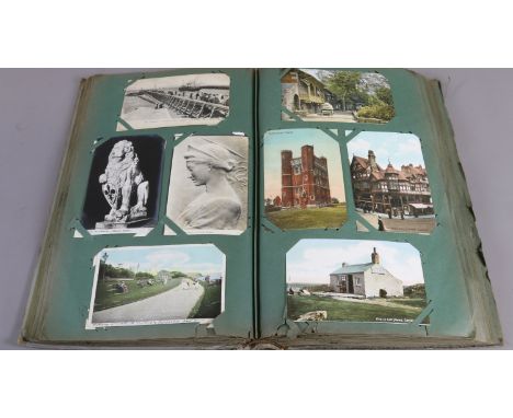 An album containing a quantity of vintage postcards to include Royal architectural, biblical interest etc.