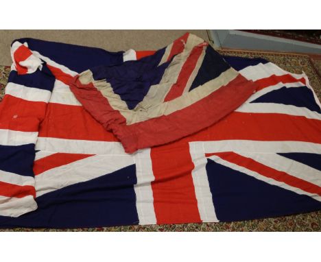 Two large vintage linen Union flags. Largest measuring 350cm x 183cm.