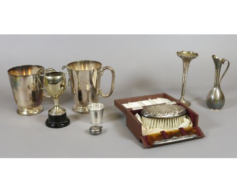 A collection of silver and silver plate to include cased brush and comb, assayed Birmingham 1956, small bud vase, assayed Bir