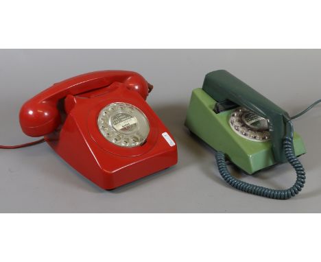 Two vintage telephones to include a red circular dial and a smaller green example.
