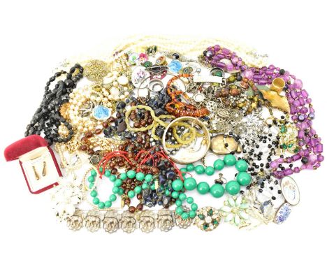 A quantity of modern and vintage costume jewellery including silver chains, bracelet, earrings, rings, etc.