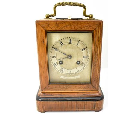 LAINE A PARIS; an early 20th century walnut cased carriage clock with chiming movement, the silvered dial set with Roman nume