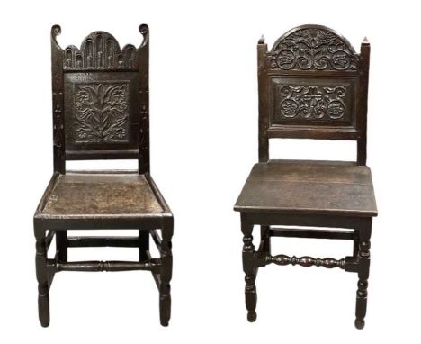 A 17th/18th century carved oak hall chair, with floral carved back panels, side supports with triangle finials and flat board