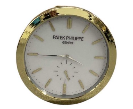 A decorative Patek Philippe style dealer's wall clock, the white dial set with subsidiary seconds and gold hour markers, the 