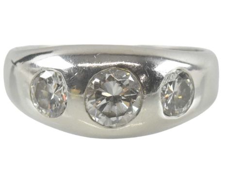 A platinum three stone diamond set ring, the central stone approx 1ct, flanked by two brilliant cut diamonds, each 0.5ct, tot