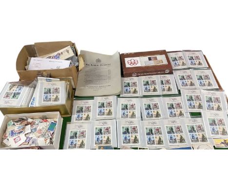 A quantity of mint GB stamps and a quantity of cigarette cards.