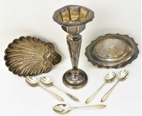 A collection of various hallmarked silver items comprising a candlestick, with tapered fluted stem, height 17cm, (loaded), a 