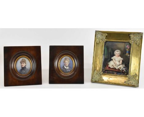 X Two 19th century oval portrait miniatures of young ladies, both painted on ivory and in mahogany frames, both overall 15 x 