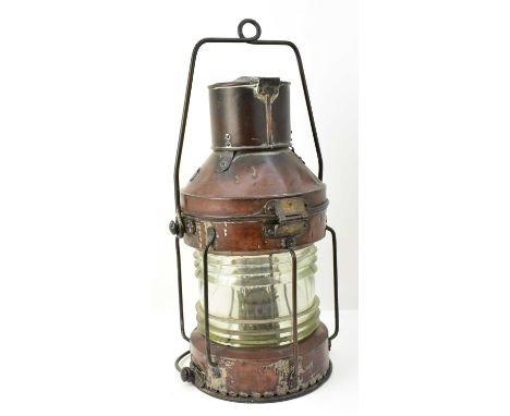 A Victorian brass and copper 'Anchor' navigation lamp, numbered 1768 to the front, complete with inner lamp.