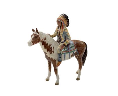 BESWICK; a ceramic model of a Native American on horseback, height 22cm.Condition Report: Both back legs have been broken off