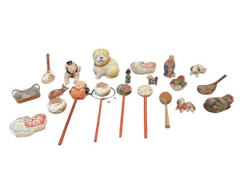 A collection of approximately fifteen early 20th century Chinese papier-mâché children's toys and rattles, including a pair o