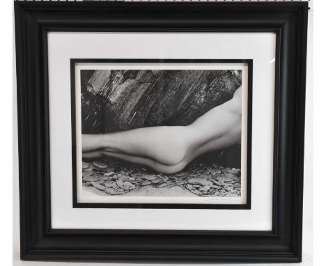 † JOHN SWANNELL; a limited edition print, 'Nude and Rock, 1985', signed lower right and numbered 15/295, 44.5 x 54cm, framed 