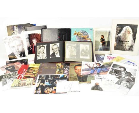 A group of various items of theatre and film memorabilia comprising photos, books, autograph albums and autographed photos, a