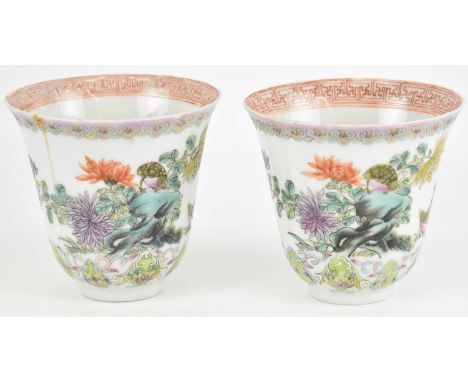 A pair of late 19th/early 20th century Chinese Famille Verte porcelain cups, decorated with birds amongst foliage (one af), h