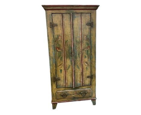 A modern green painted shabby chic pine wardrobe, decorated with birds amongst foliage, with pair of cupboard doors above sin