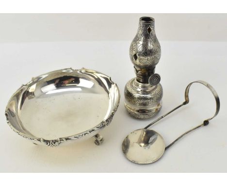 Two Egyptian stamped silver items comprising an unusual small paraffin lamp with reflective circular back, marks to base, hei