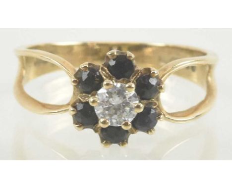 A 9ct gold white stone and sapphire cluster ring, size M, approx 2.5g.