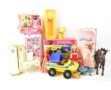 A group of Sindy and other vintage toys including Sindy's Own Wardrobe, camper buggy with fold-away tent, dressing table and 