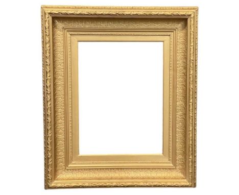 A large early 20th century gilt picture frame, overall 81 x 96cm, picture display area 44 x 59.5cm.