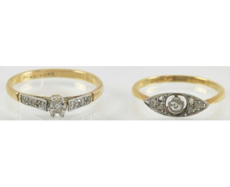 Two 18ct gold diamond set rings, one in the Art Deco manner in the form of an eye, with a central bevel set tiny diamond in a