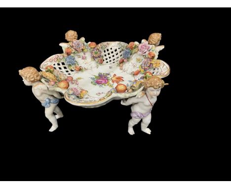 DRESDEN; a large early 20th century floral encrusted pierced porcelain centrepiece, with hand painted floral decoration and f