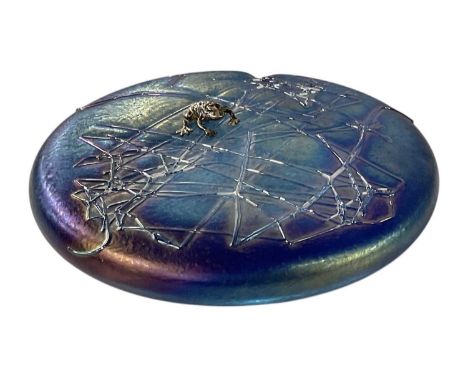 † JOHN DITCHFIELD FOR GLASFORM; a round glass iridescent blue lily pad paperweight, with hallmarked silver frog to top, signe