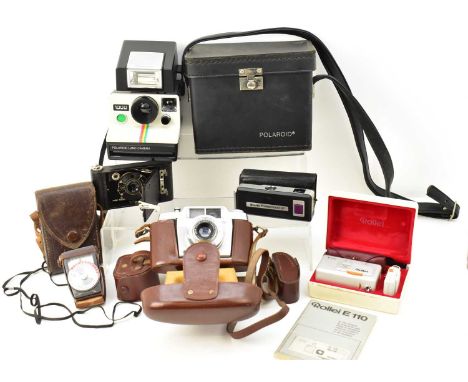 Four vintage cameras including a Rollei model E110, cased with instructions, an Agfa Silette Pronto, in leather case, a Kodak