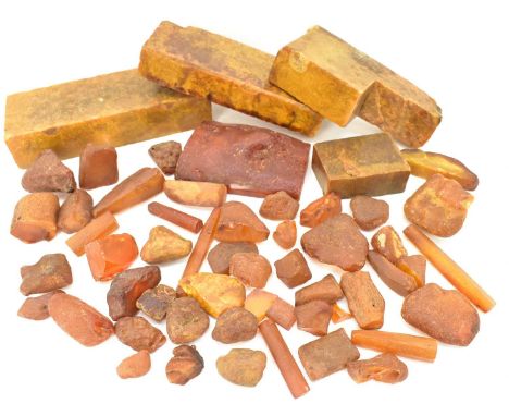 AMBER; various bars, part bars and rough nuggets, all from a pipe maker's workshop, the largest block measures length 17.5cm,