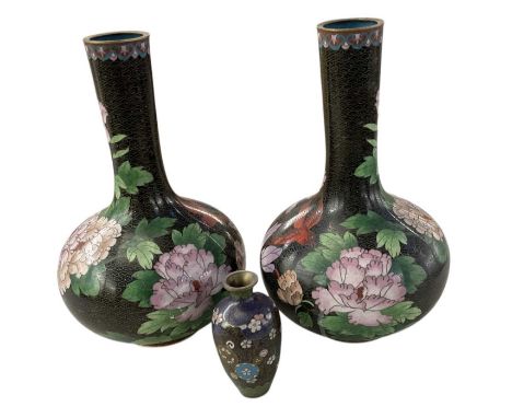 A pair of modern Chinese cloisonné enamel black ground floral decorated vases of bulbous form, height 31cm, and a smaller Chi