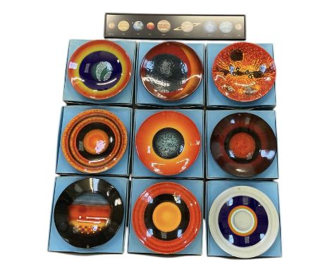 ALAN CLARKE FOR POOLE POTTERY; a set of nine 'Alignment of the Planets' chargers, dated 2000, limited edition of 500, the set