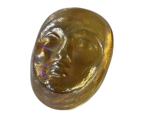 † JOHN DITCHFIELD FOR GLASFORM; a rare iridescent amber coloured mask wall plaque, height 9cm, width 6cm, with etched signatu