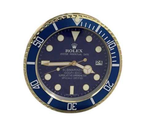 A decorative Rolex Submariner Oyster Perpetual Date style dealer's wall clock, with blue dial and blue bezel, the dial set wi