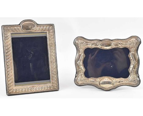 A modern hallmarked silver elaborate easel back photograph frame, Sheffield 1994, 17 x 14.5cm, and a Mappin &amp; Webb modern