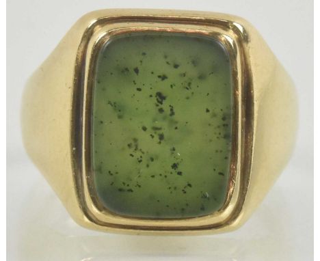 A 10k gold signet ring, with bevelled green table in bezel mount, size U, approx 7.8g.