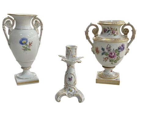 A Continental hand painted floral decorated twin handled urn, with pseudo Meissen crossed swords mark to base, height 22.5cm,