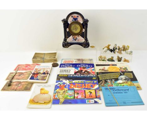 A group of mixed collectables including various Wade Whimsies, a pottery Gaudy Welsh patterned table clock, various world ban