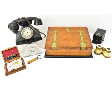 A group of various collectables comprising a vintage black telephone converted to modern plug, an oak cased knee writing slop