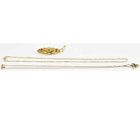 A 9ct gold bar brooch with central star set sapphire flanked by two small seed pearls, length 4.5cm, a seed pearl and ruby se