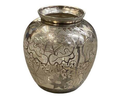 An early 20th century Art Nouveau overlaid silver glass vase, decorated with birds, squirrels and spiderwebs amongst foliage,