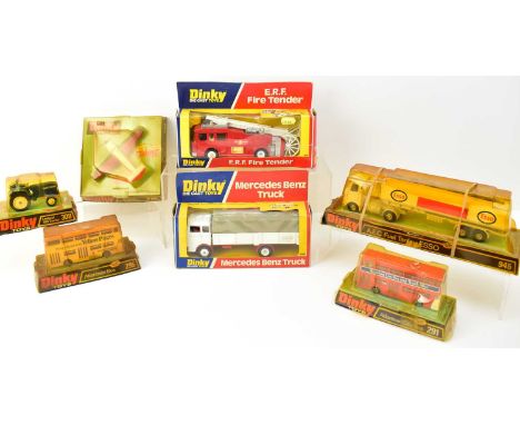 DINKY; seven boxed/packaged diecast vehicles including 266 E.R.F. Fire Tender, 291 Atlantean City Bus, 295 Atlantean Bus, 308