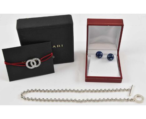 CHRISTIAN DIOR; a pair of gold plated lapis lazuli effect cufflinks, a Bulgari 925 silver double loop bracelet and a Gucci 92